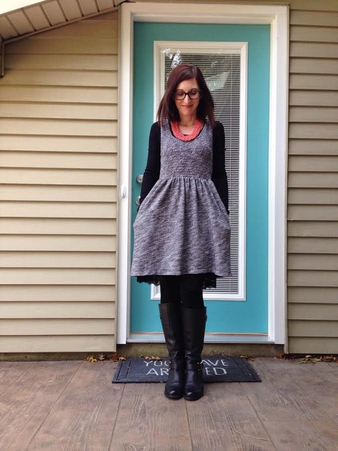 sweater dress + petticoat slip + tights + boots + statement necklace