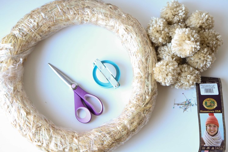 How to Make a Yarn Pom-Pom Wreath from MomAdvice.com