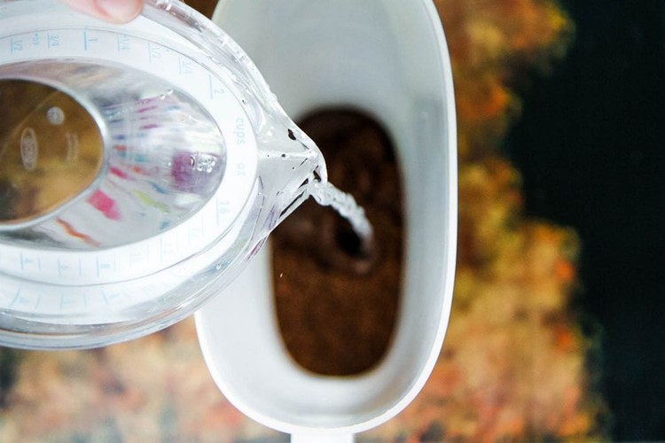 Pouring Water Into Coffee Grounds