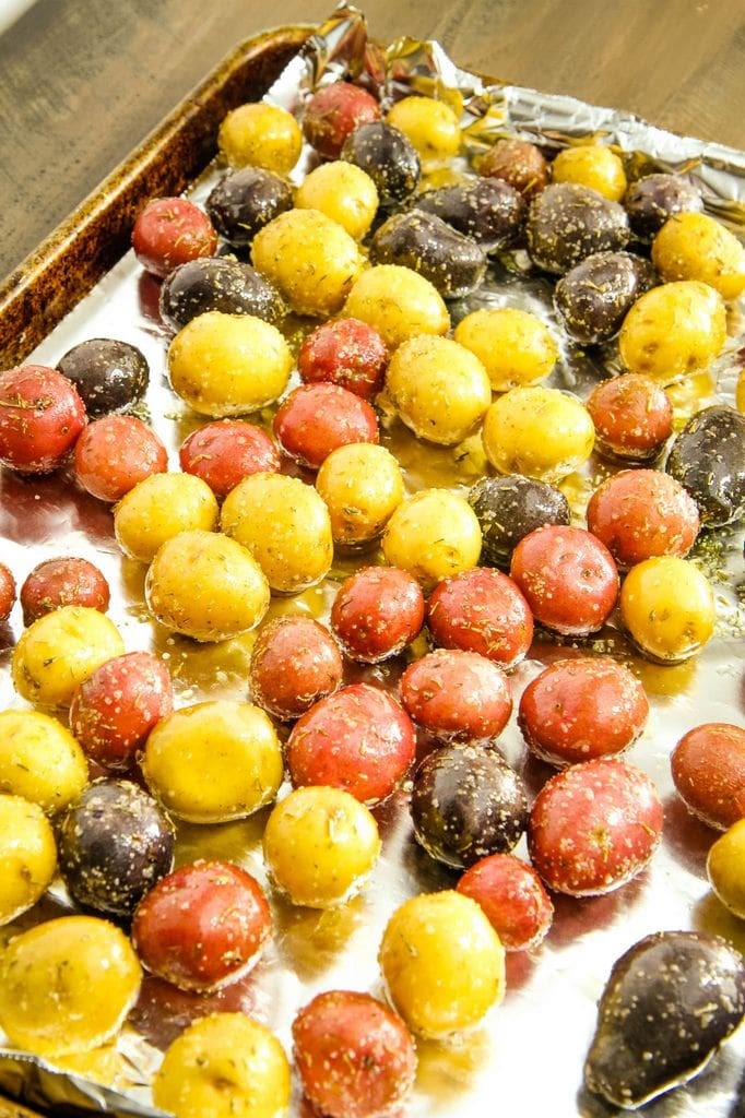close-up of baby potatoes on cookie sheet