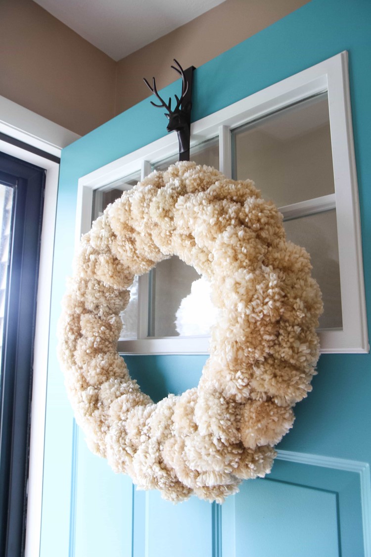 How to Make a Yarn Pom Pom Wreath