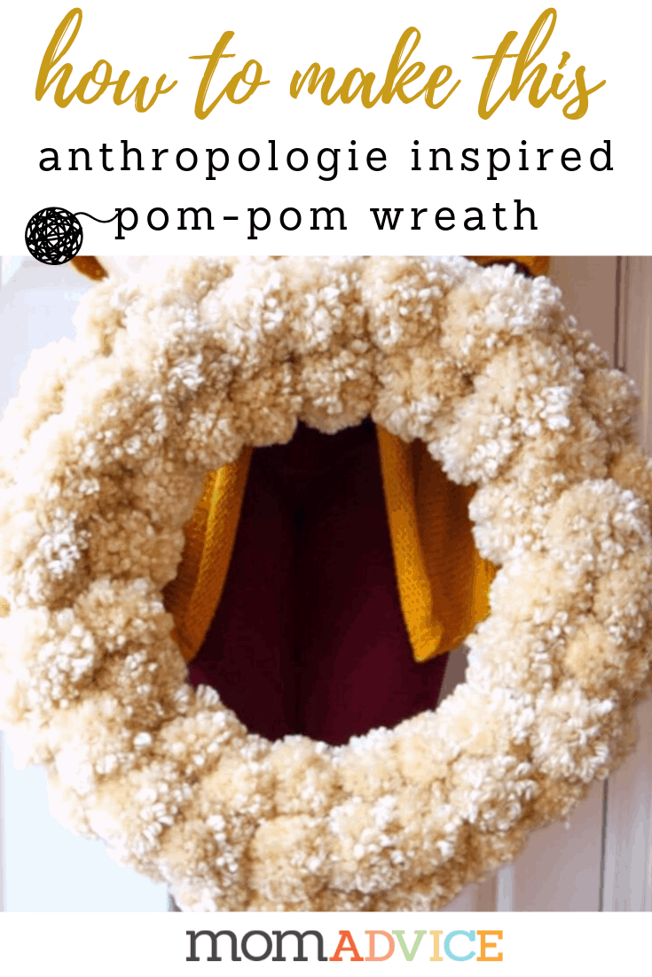 How to Make a Yarn Pom Pom Wreath from MomAdvice.com